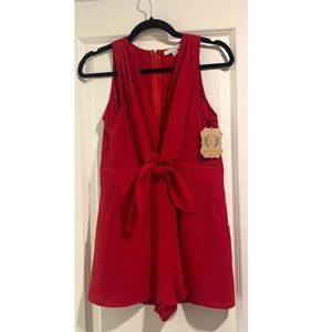 NWT boutique romper with pockets